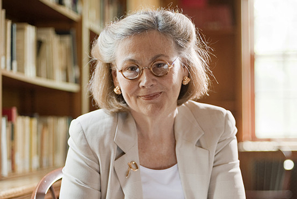 Alicia Munnell sits in her office