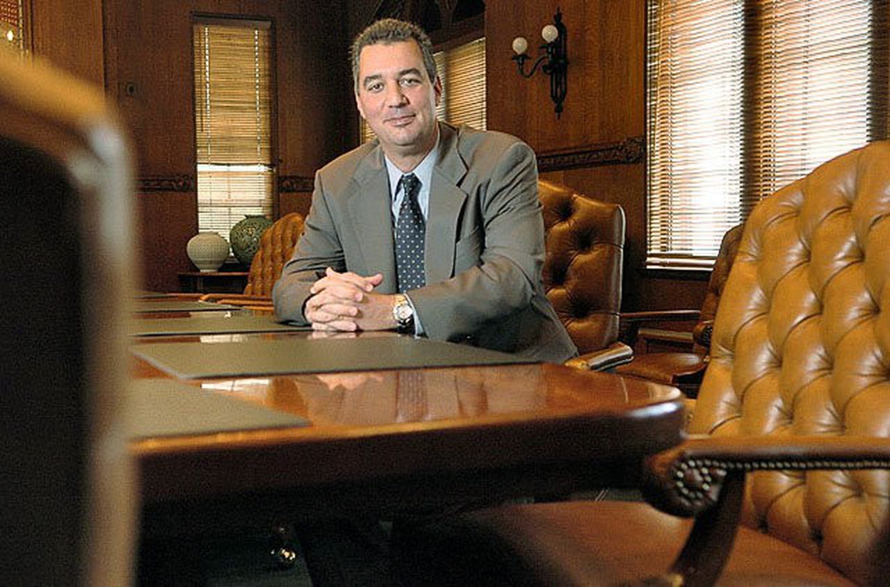 Jim Joseph sitting at a desk