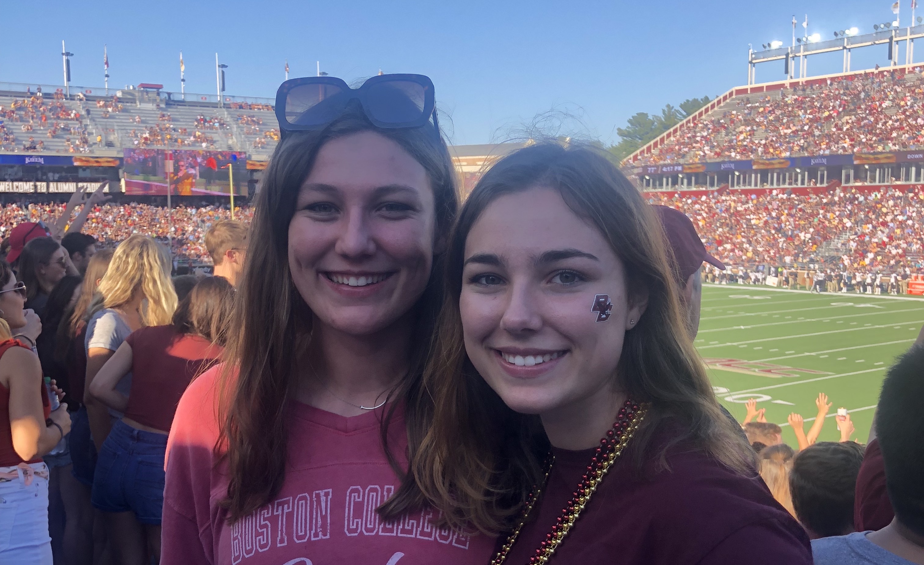 CeeCee and Eva Van Pelt at a BC football game in alumni stadium 