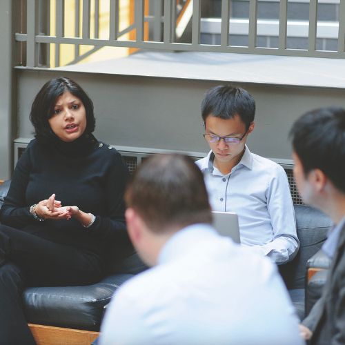 MBA students in Fulton lobby