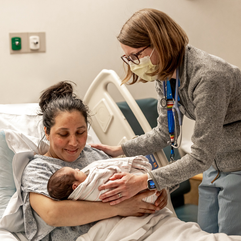 January 27, 2025 -- Boston College Connell School of Nursing participating in the midwifery program at Mount Auburn Hospital in Cambridge, Massachusetts, with Katie (Katharine) Hutchinson, Associate Professor of the Practice, Connell School of Nursing (black blazer), and Julia Dickinson, Director of Midwifery Services, Midwives at Mount Auburn Hospital (scrubs).