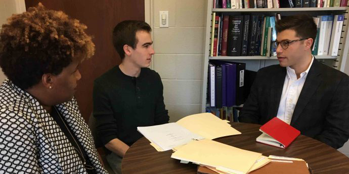 Students and clients with professor