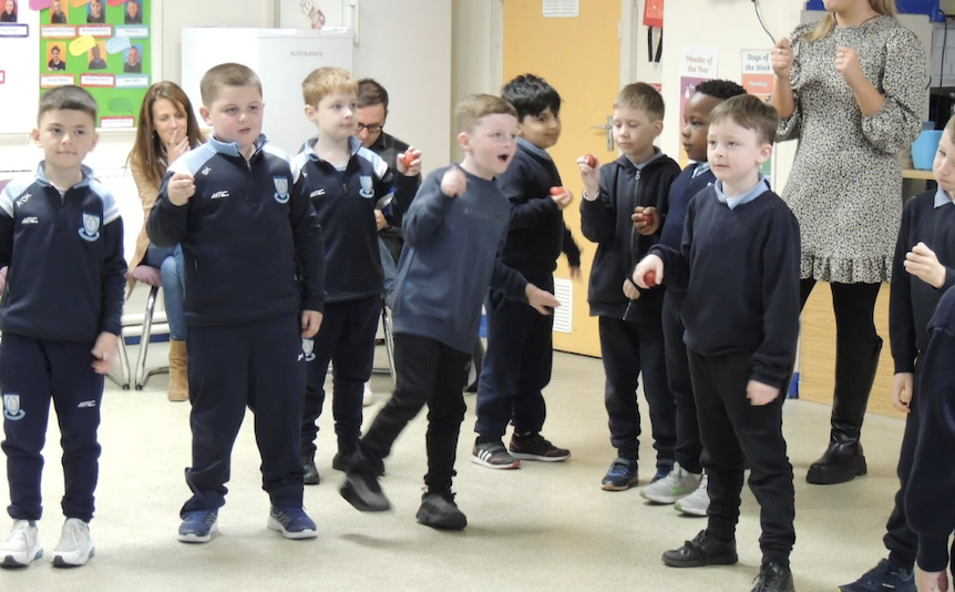 Students signing at St. Vincent’s Infant Boys’ School in Dublin, Ireland.