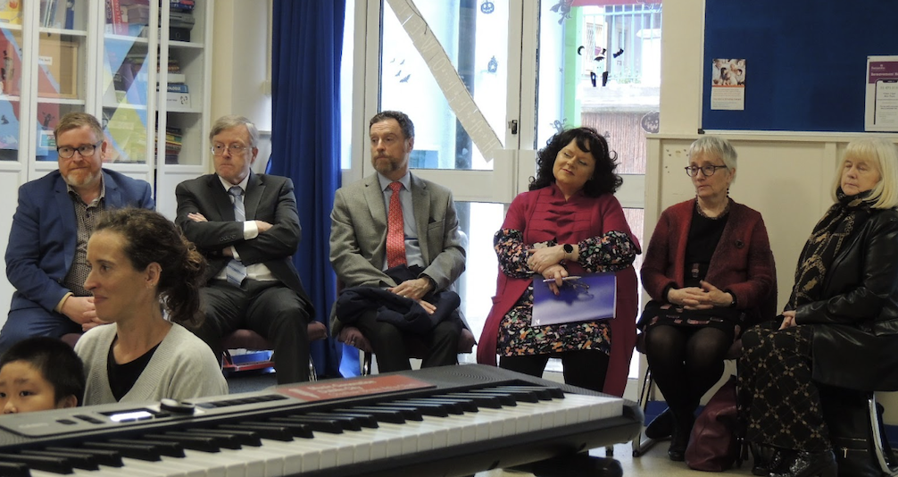 Gerry Cullen, Eugene Wall, Stanton Wortham, Eucharia McCarthy, Ann Higgins, and Emer Ring watch students at St. Vincent’s Infant Boys’ School in Dublin, Ireland.