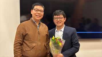 Group's first Ph.D.