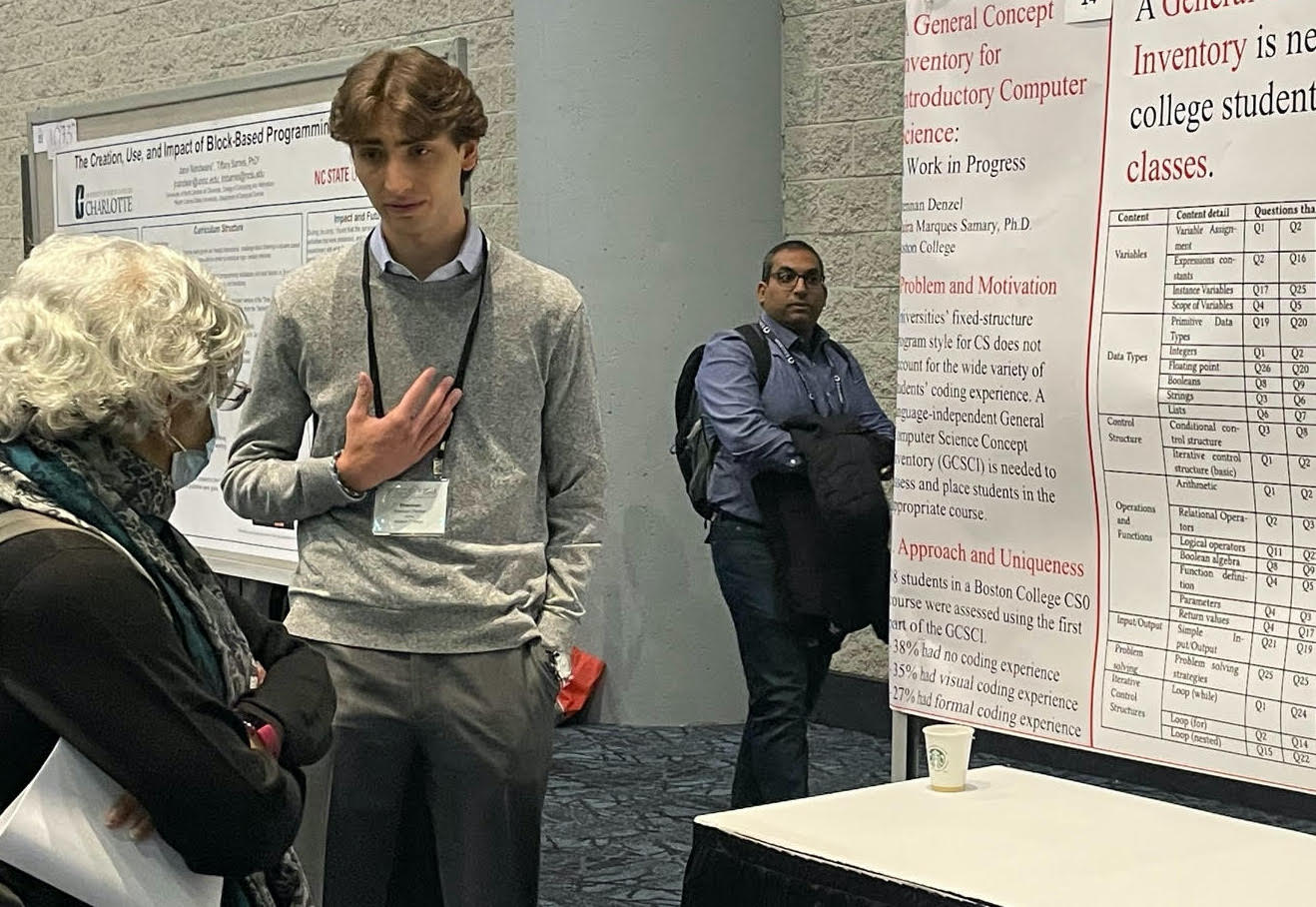Brennan Denzel '23 presenting his poster at the ACM SIGCSE Student Competition in Toronto, Canada