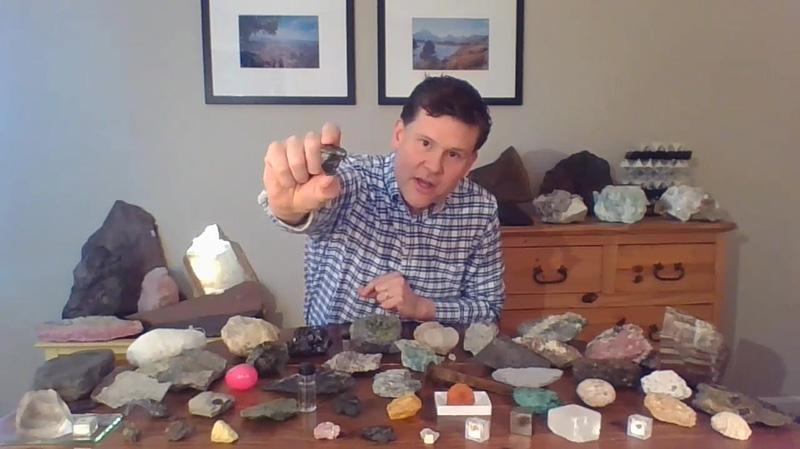 A man holding a rock