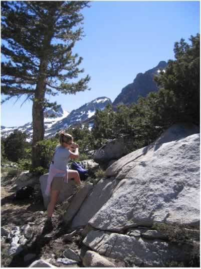 A person on the side of a cliff