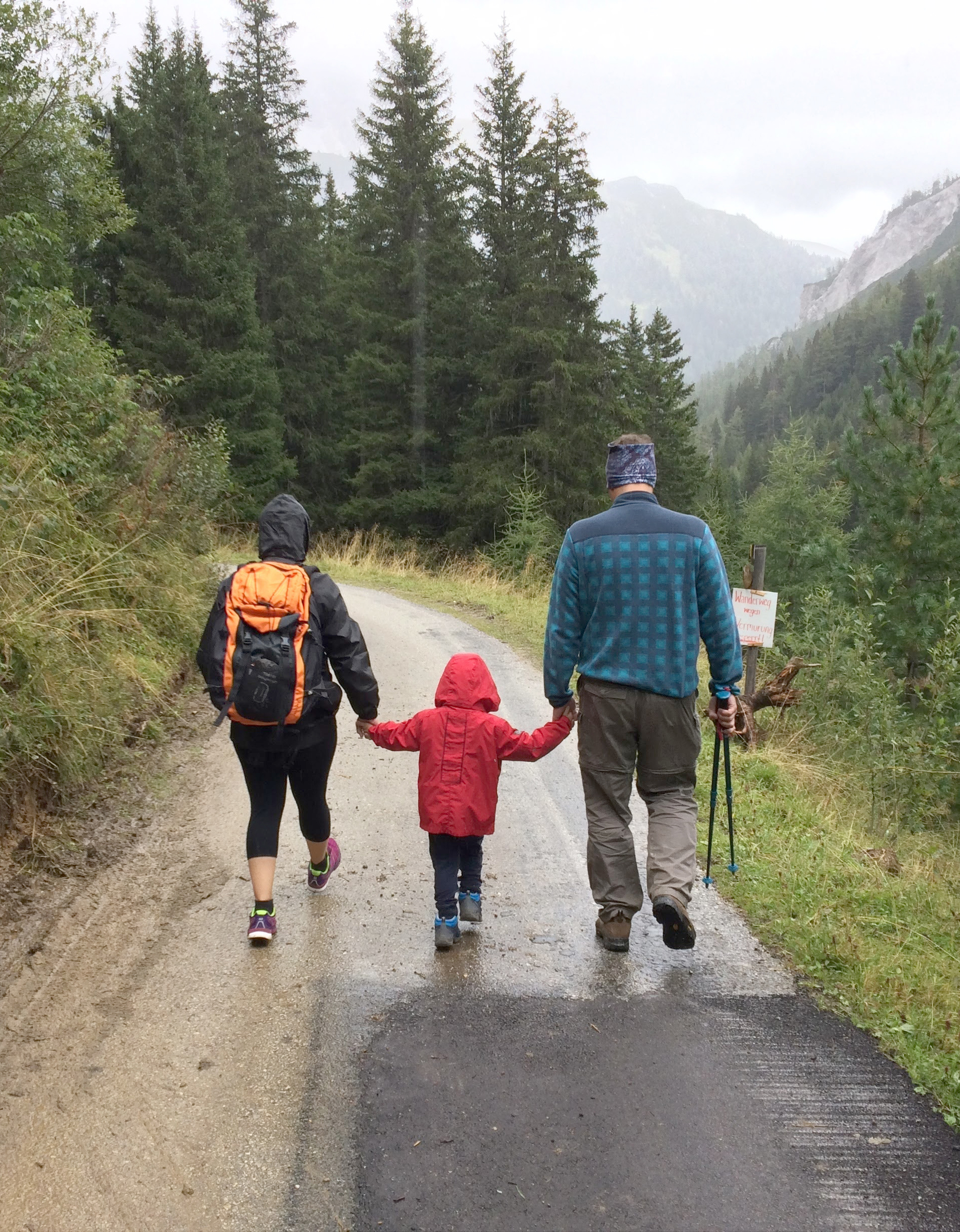 A Family Walking in the Mountains