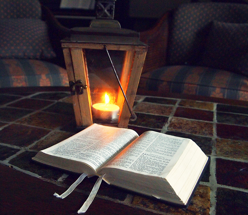 A lantern with a Bible