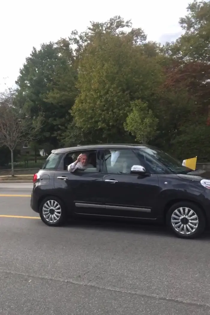 Pope Francis waving