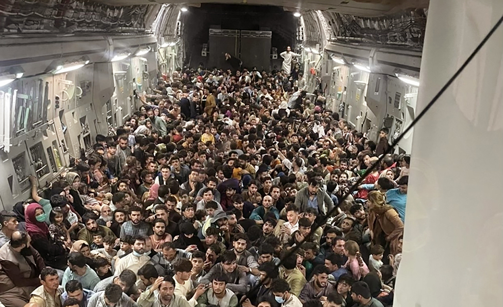 Afghan citizens pack inside a U.S. Air Force C-17 Globemaster III