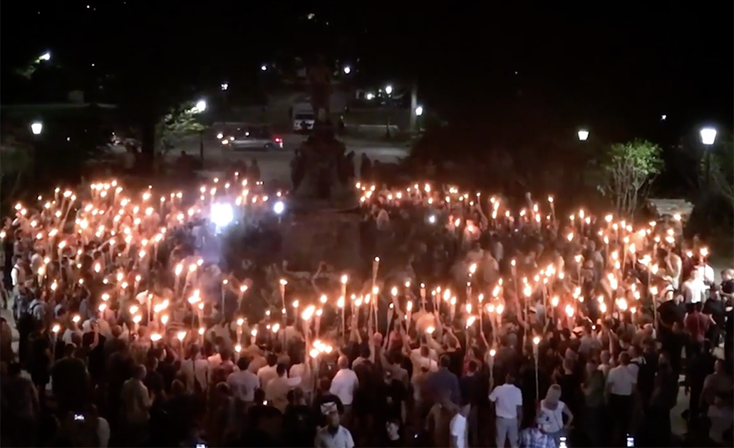 People hold torches at the Unite the Right Rally in Charlottesville