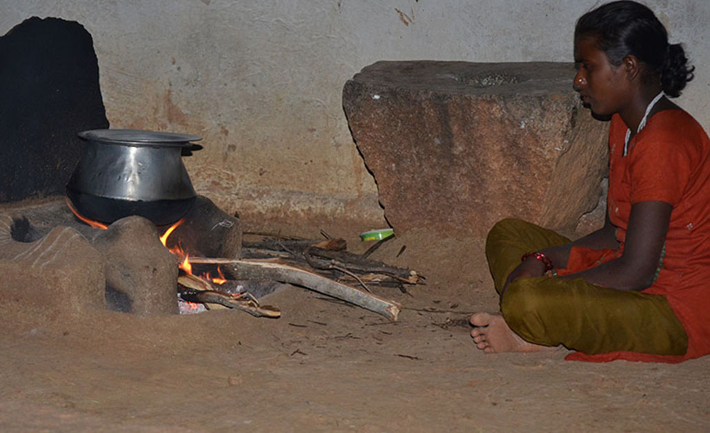 A woman uses a traditional cookstoves in a village in Andhra Pradesh, India.