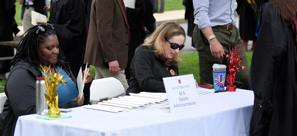 Woods College Diploma Ceremony Registration Table
