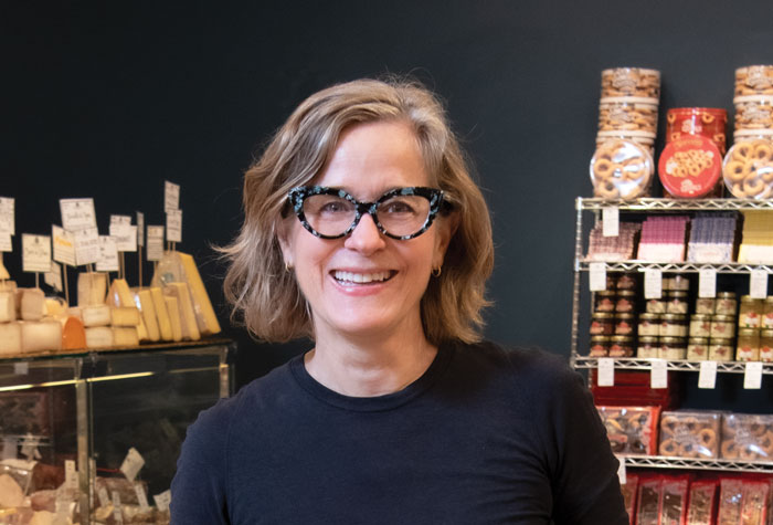 Valerie Gurdal ’85 in her shop Formaggio Kitchen