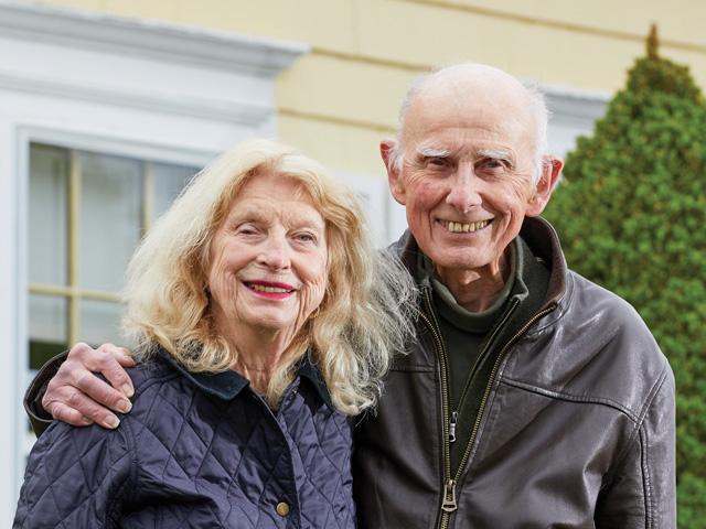 Jeff and Margaret Flagg outside their West Roxbury home