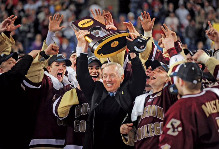 York and trophy surrounded by his team