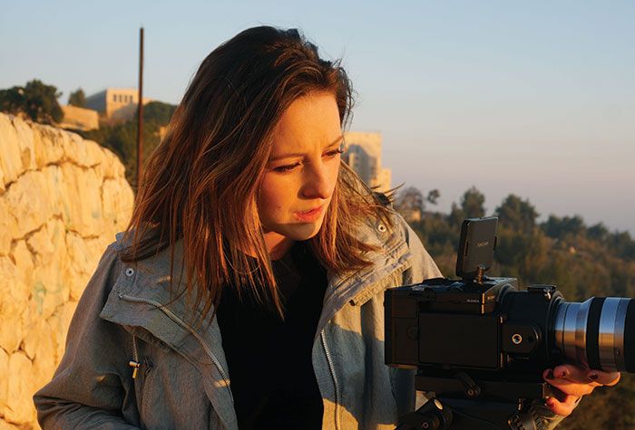 Audra Hampsch filming on site in Israel