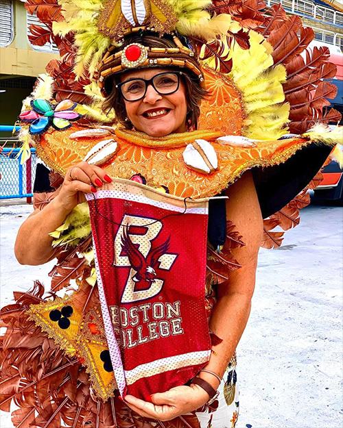 A woman dressed in a colorful costume