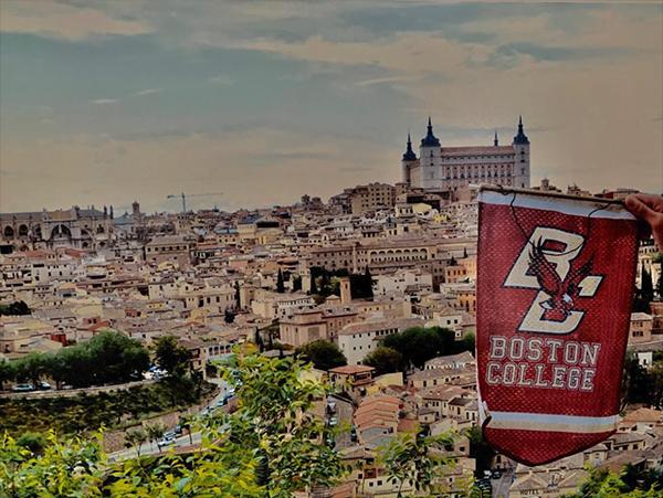 The BC banner held in front of a cityscape