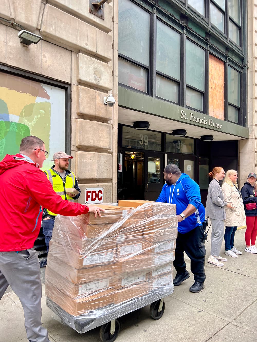 BC staff delivering boxes to St Francis House