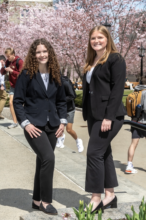 Meghan Heckelman & Katie Garrigan standing outside