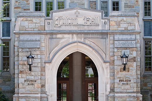 Fulton Hall's arched stone entryway 