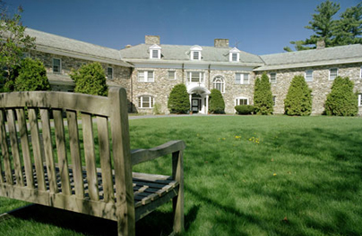 A serene image of the exterior of a retreat location.